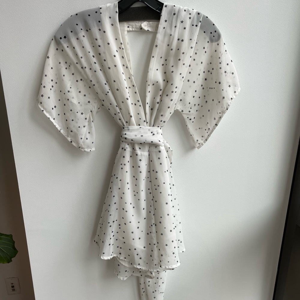 Showpo white romper with stars!